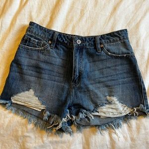 High rise distressed hem denim shorts
